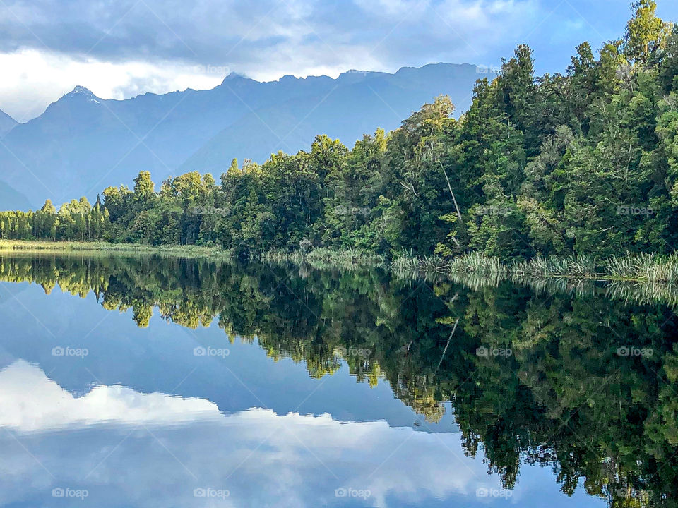 Seeing double when a perfect reflection of the tree line is cast over the lakes surface