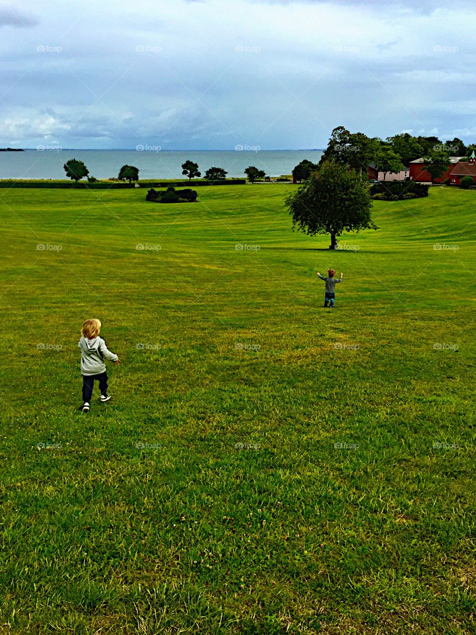 The boys run down the hill! 