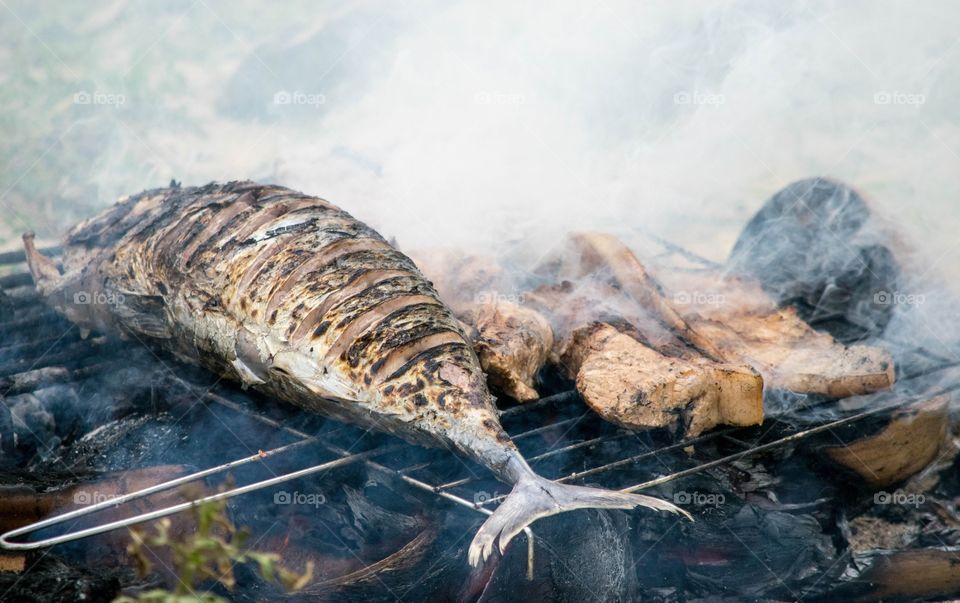 Close-up of fresh seafood on barbecue grill