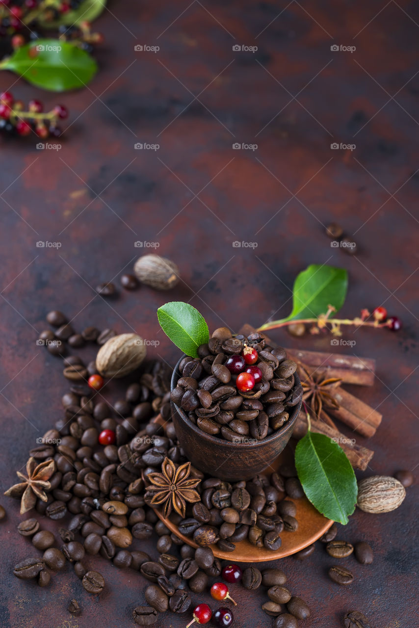 Coffee beans with leaves and spice