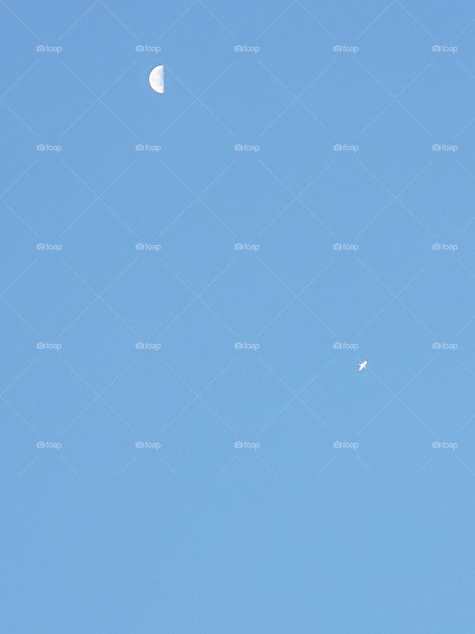 Half moon and airplane