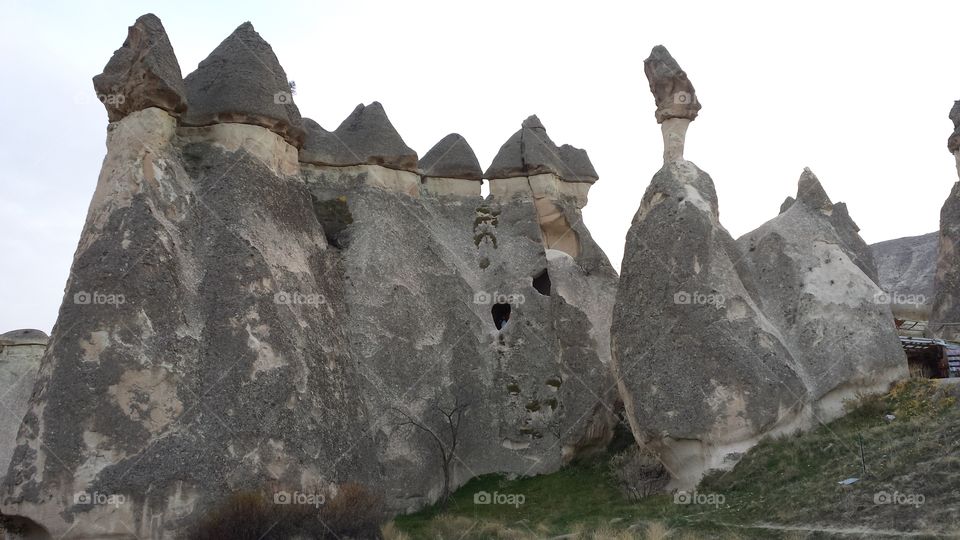 Cappadocia Rocks . This is a formation of rocks in Cappadocia,  Turkey.  It made me think of a group of monks bowing their heads.  