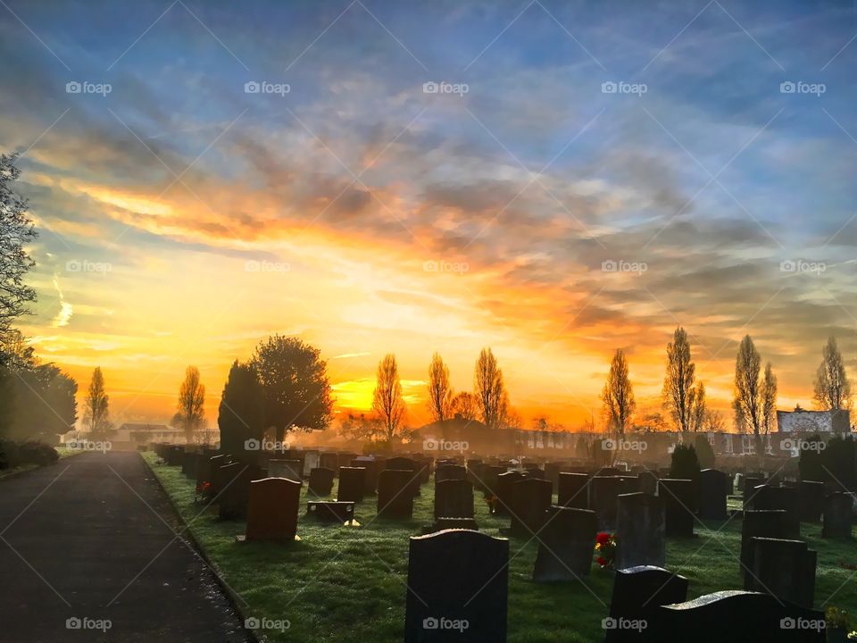 Sunrise / sunset over graveyard 