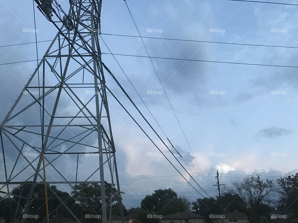 Incoming storm clouds and power lines