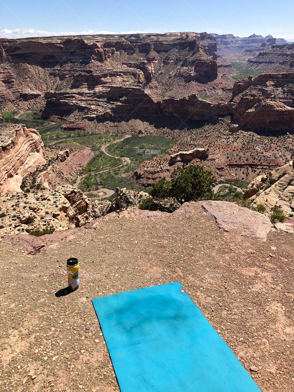 Morning yoga and coffee in an exhilarating but serene spot overlooking a red rock canyon 