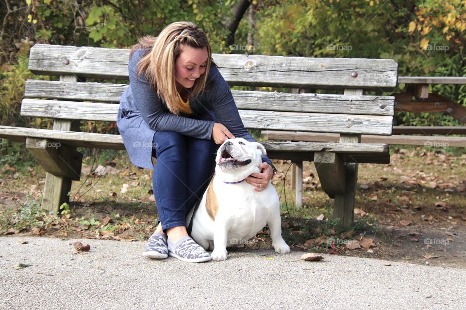 Woman with bulldog