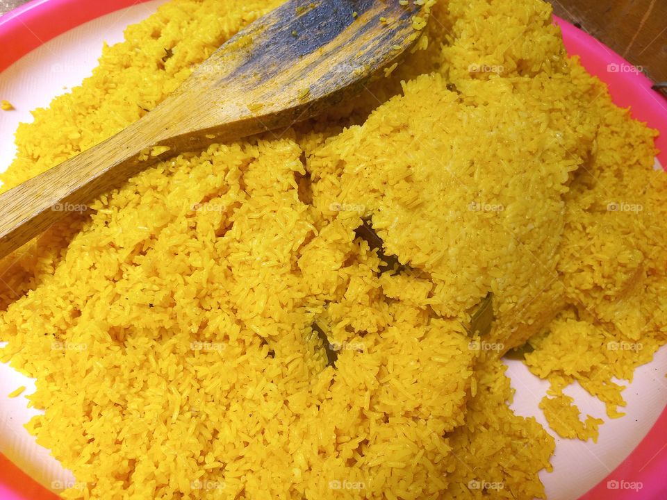 This dish is made from rice cooked together with turmeric and coconut milk and spices