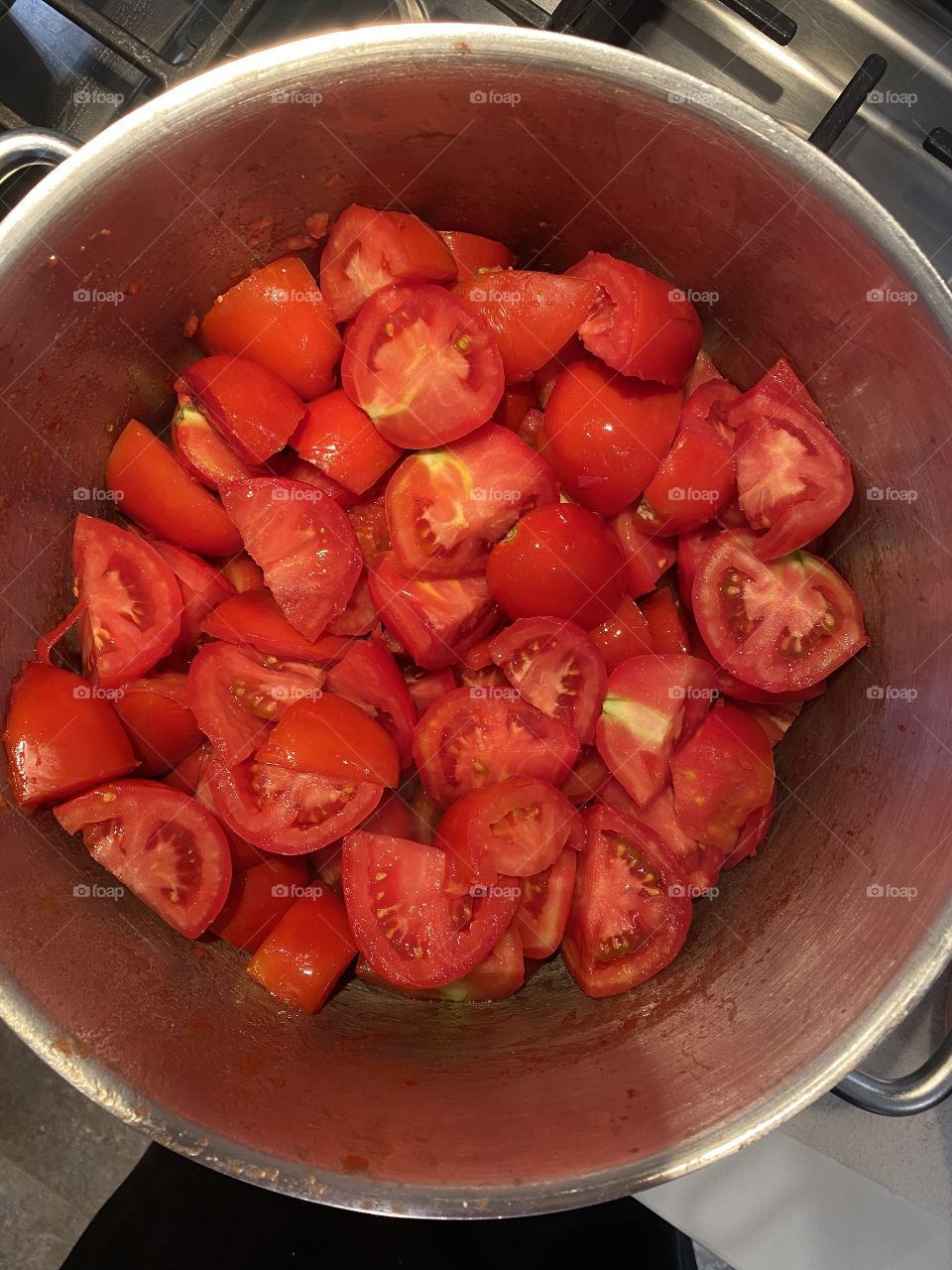 Tomatoes for sauce. Cooking tomatoes.