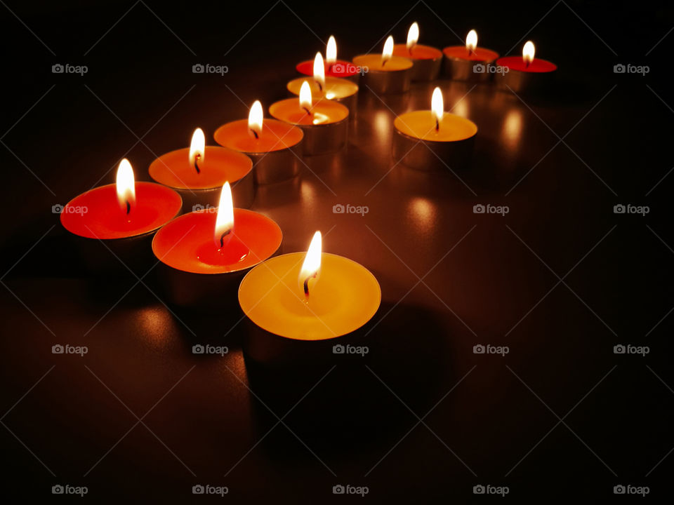 Tealight candles with blurred dark background