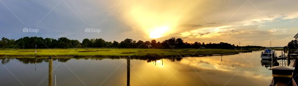 golden sunset water reflection