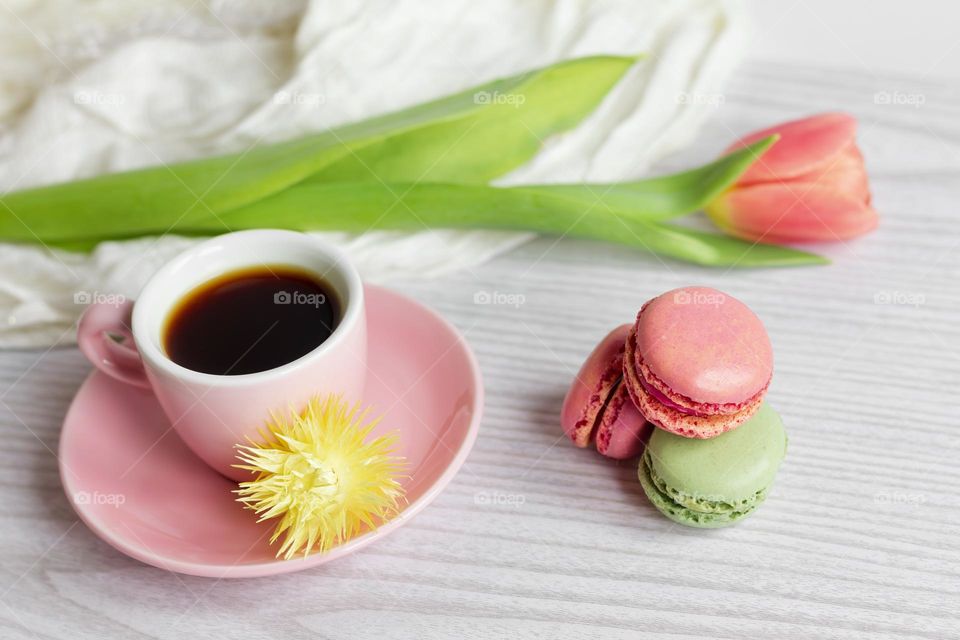 Black coffee & macaroons with a tulip