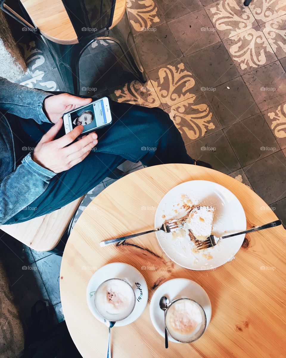 Man using mobile at the cafe 