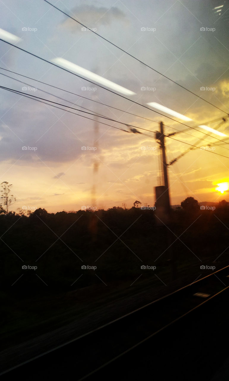 On The Train. On the way to work, the sun is not even completely up