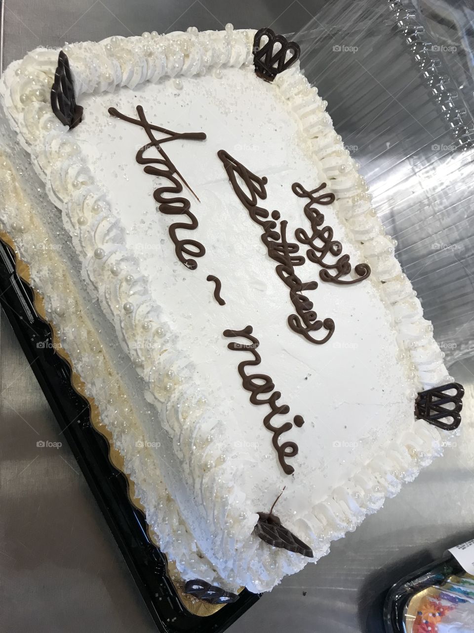 Simple birthday cake I made at work for nothing extra except for the fun of making it