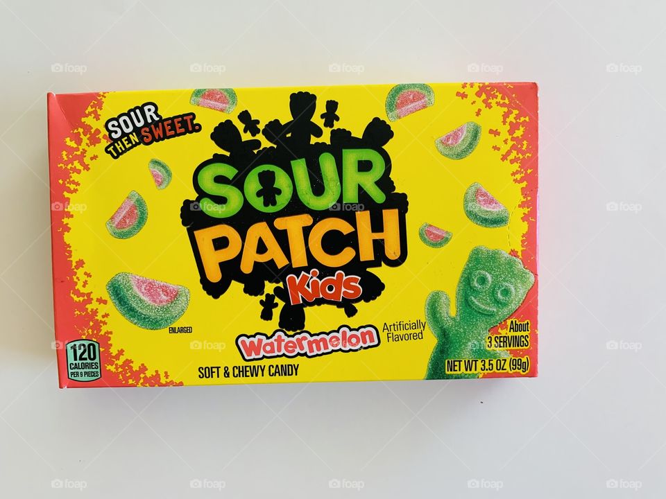 A box of watermelon flavored sour patch kids on a white background 