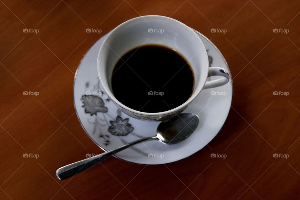 A cup coffee at table