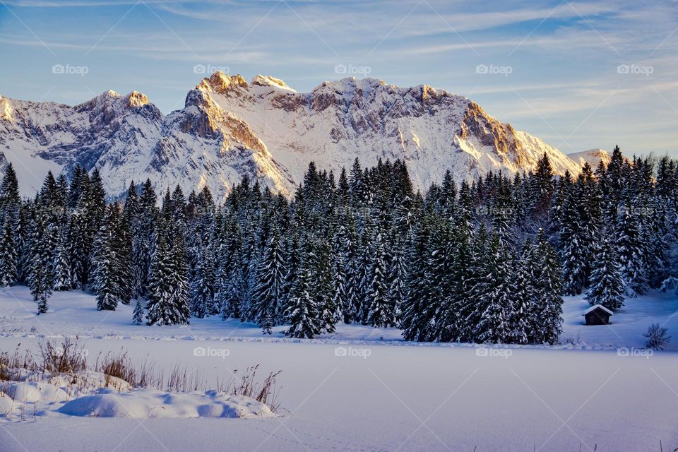 Sun kissed snow capped mountains. 