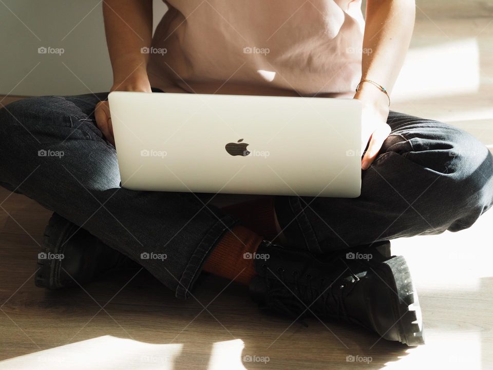 Unrecognisable woman with modern laptop 