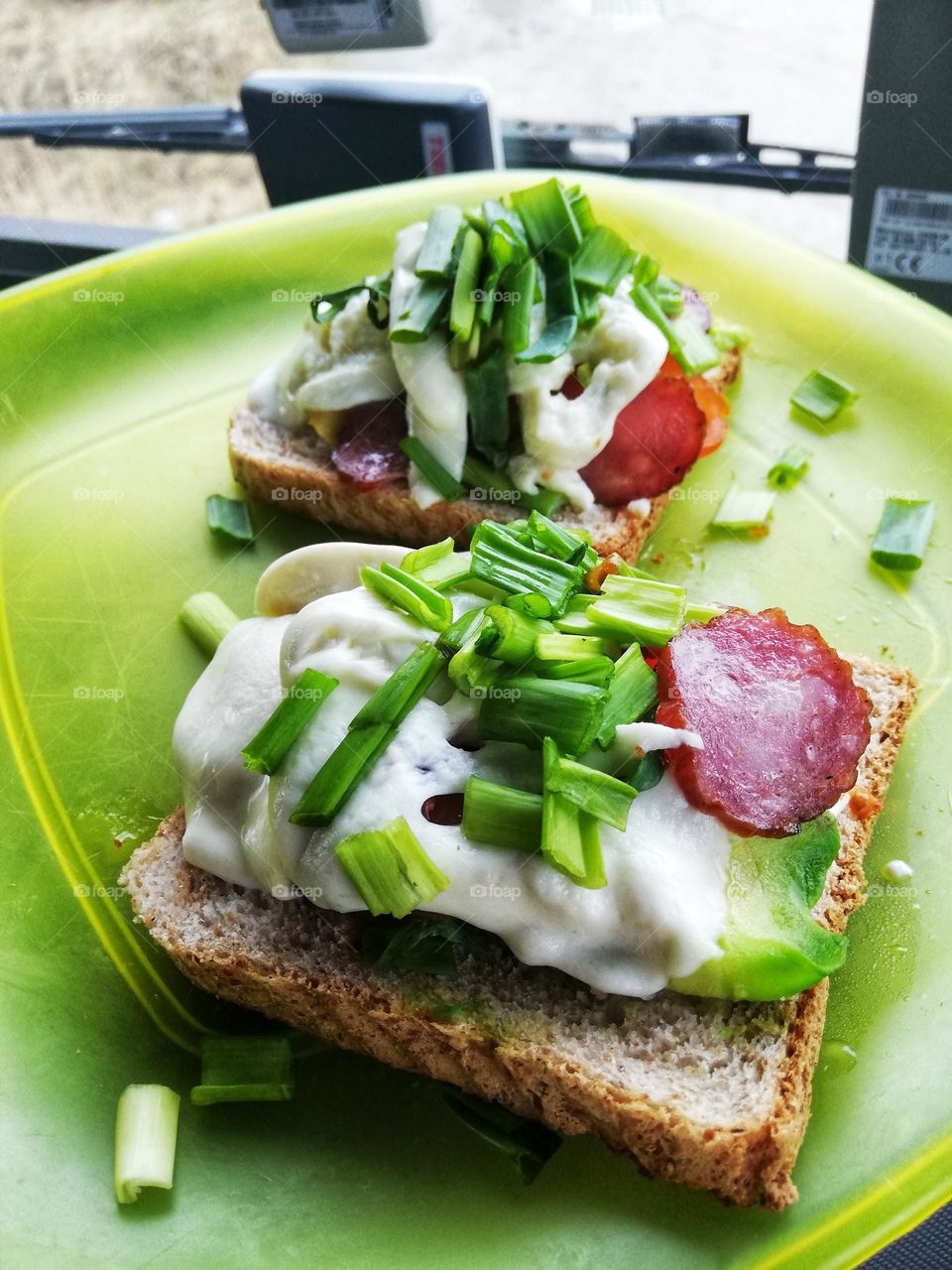 Healthy breakfast in the truck. Sandwiches with mozzarella and chives.