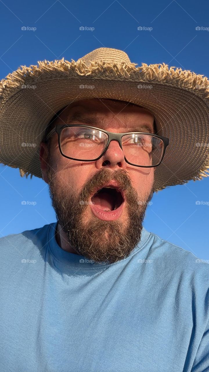 portrait of bearded man with glasses