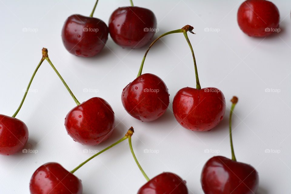 red cherry tasty summer food white background