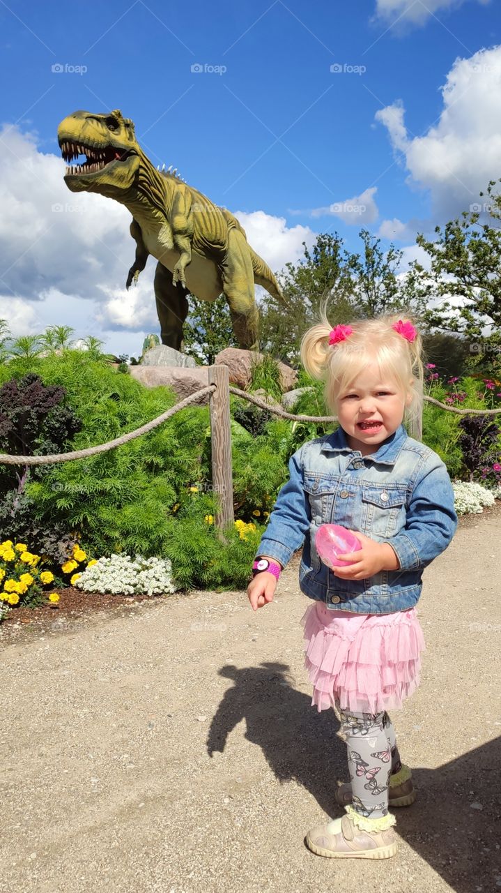 little Girl and the dinosaur. t-rex