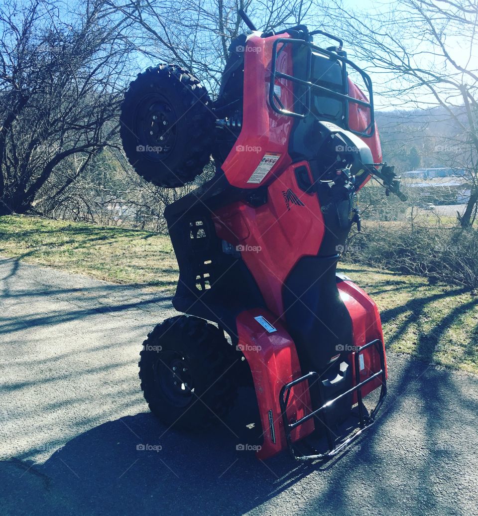 Walking four wheeler