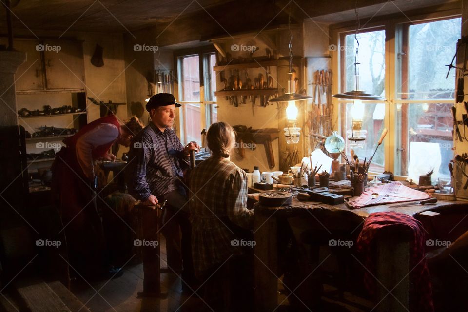 Group of people working in workshop