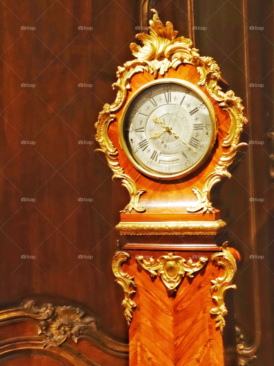 Antique Grandfather Clock. Ornately Carved Antique Timepiece
