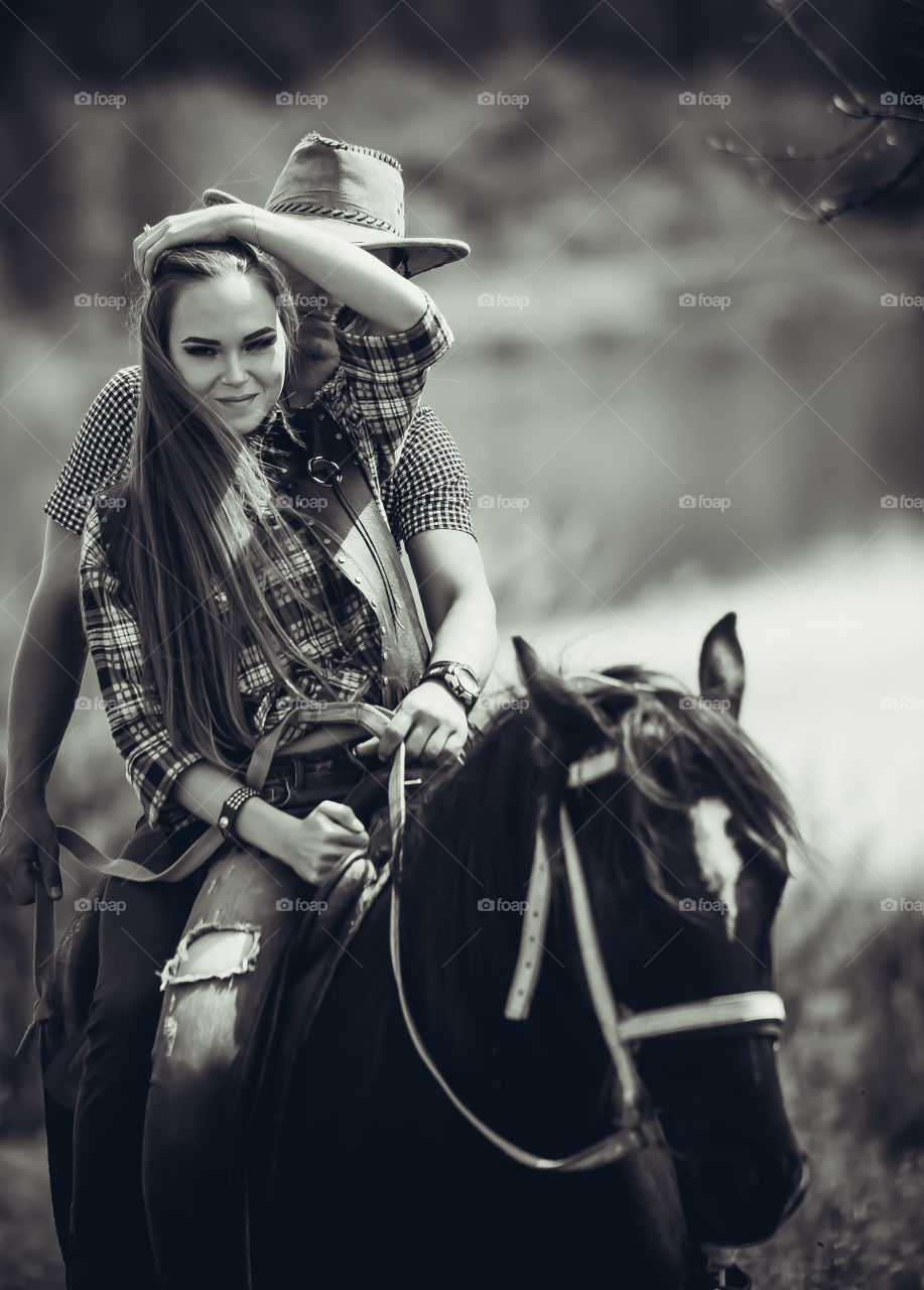 Couple riding horse