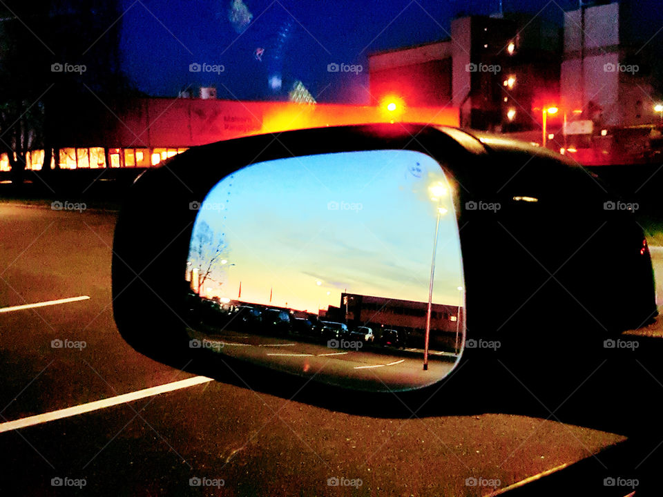 Sunset in car mirror
