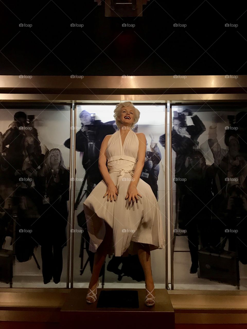 Lady Gaga Wax Statue Madame Tussaud London wearing a white dress
