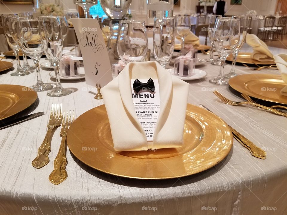 Tuxedo menu and napkin fold
