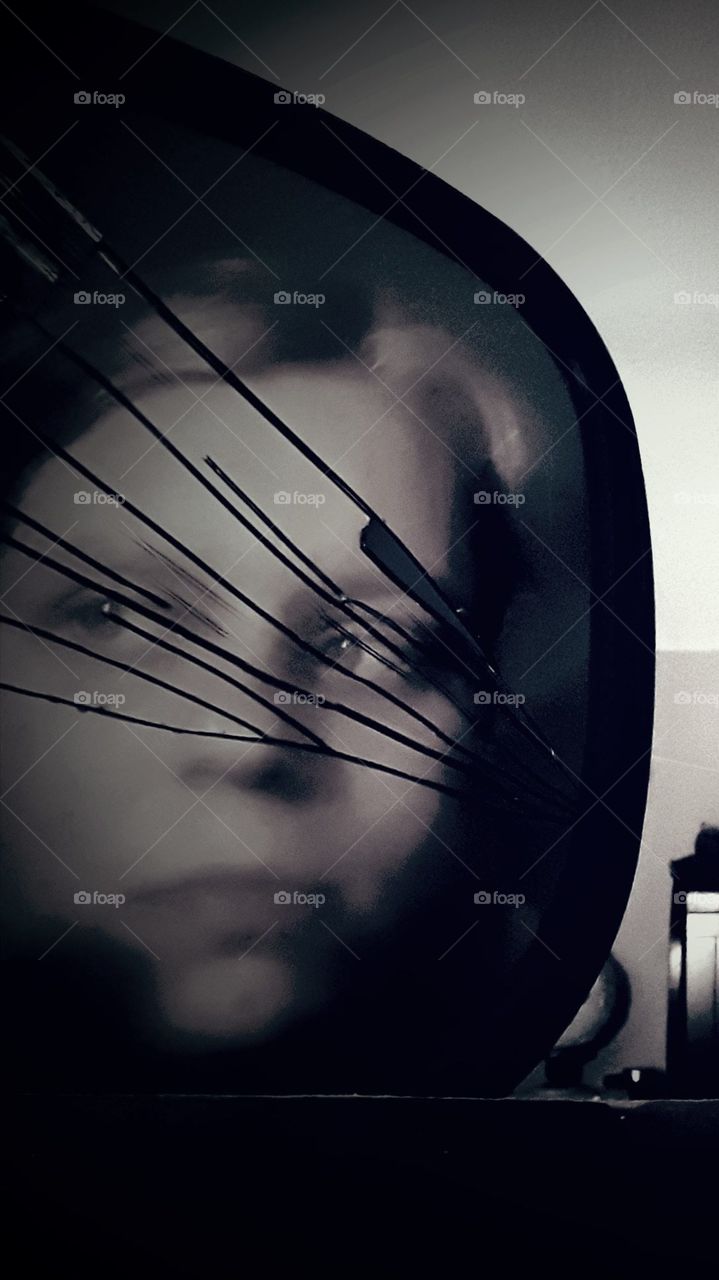 broken mirror face reflection