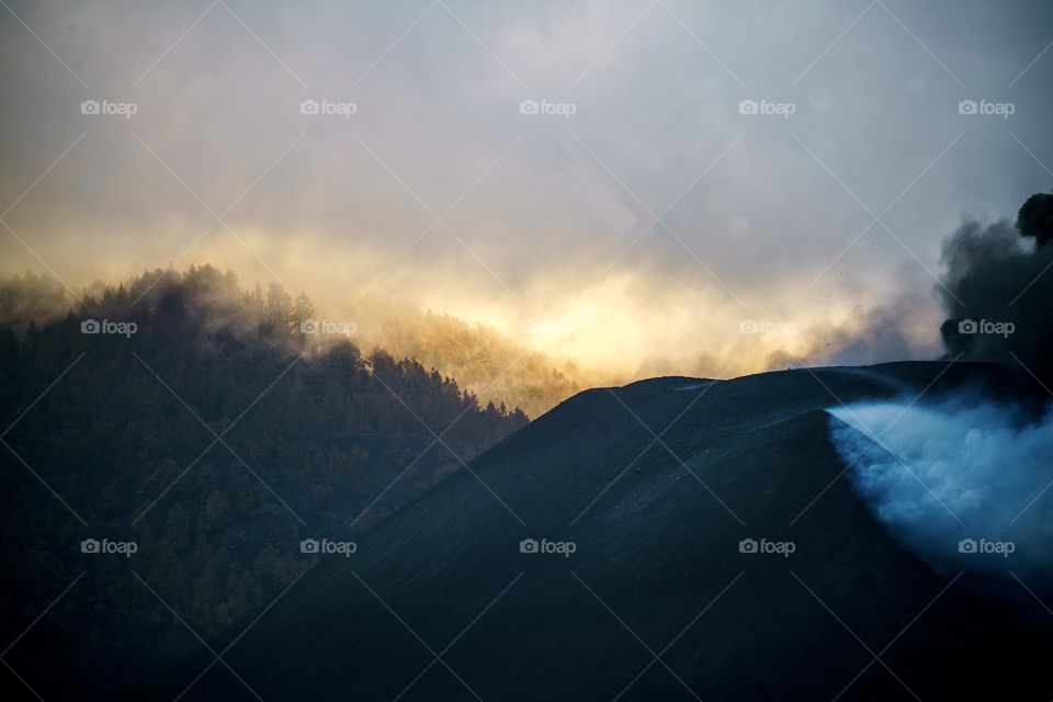 Sunset behind Cumbre Vieja Vulcan in Eruption. 