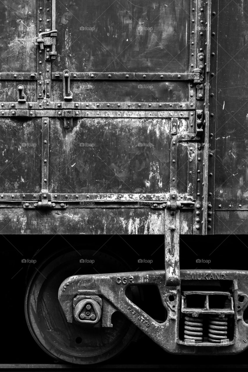 Railway carriage at Anuradhapura railway starion, Sri Lanka. Old, rusty but still effective and functional rail cart.