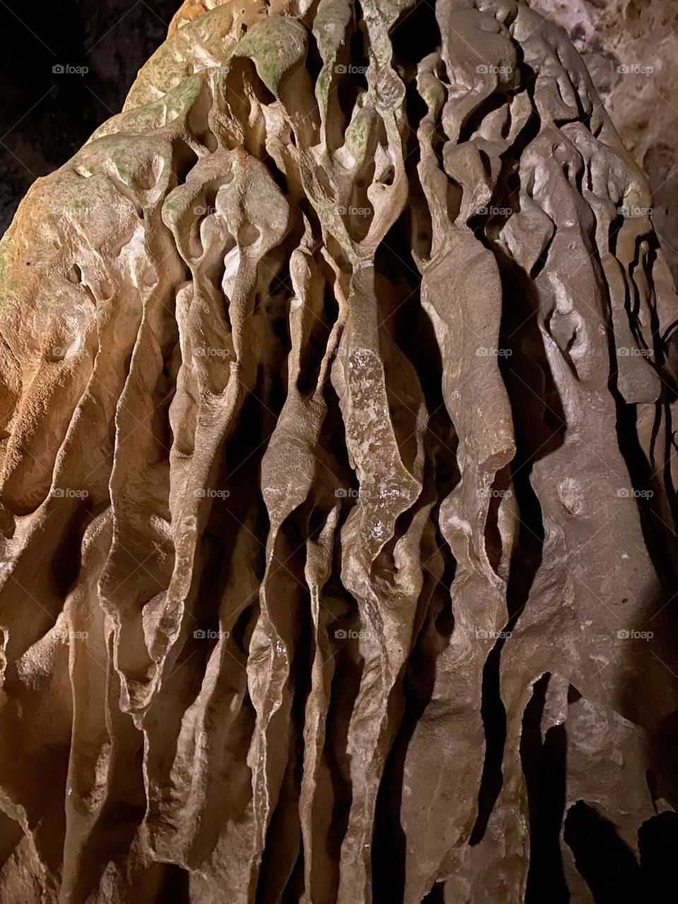 Striations in rock formation in cave