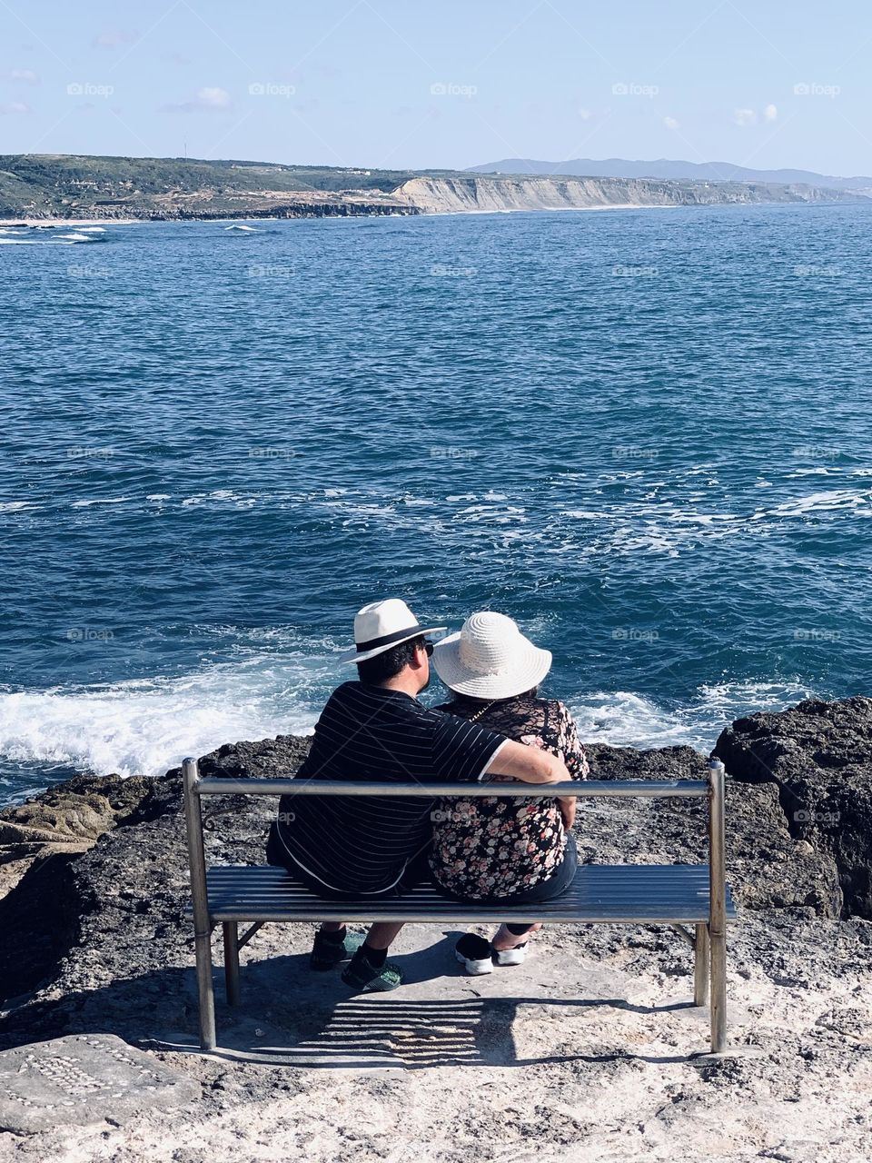 Couple by the water