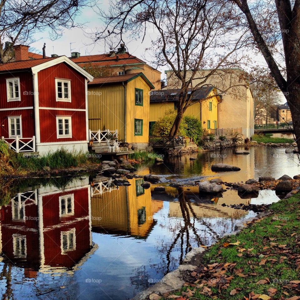 Reflection of houses on canal