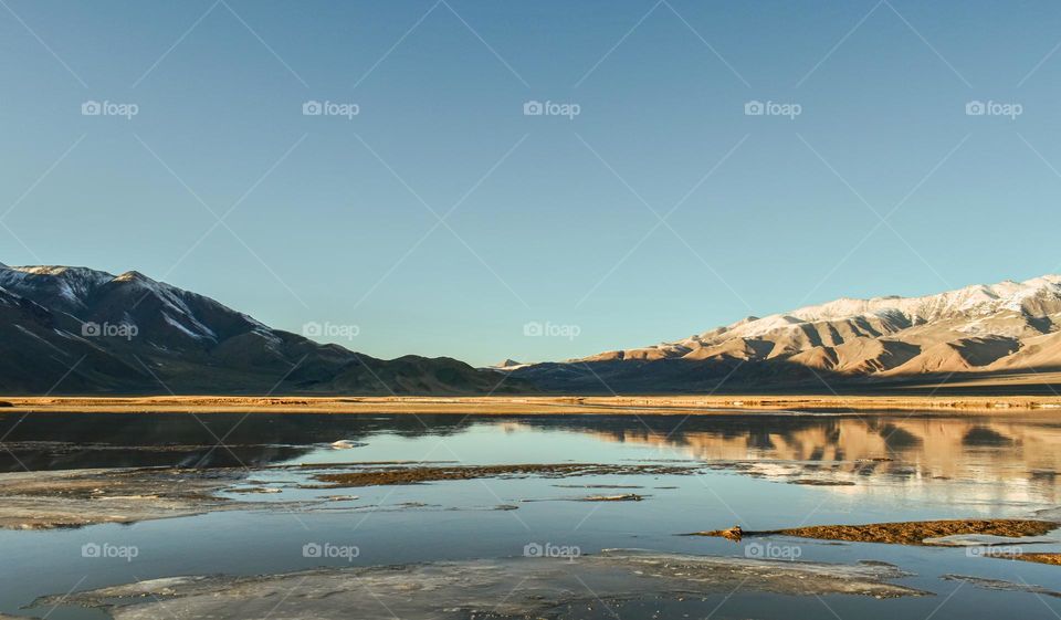 reflection of Himalayan ranges and clear sky