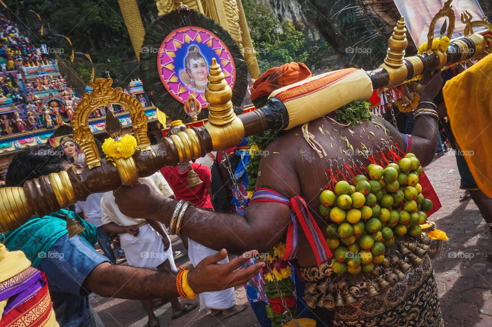 A man making his religious pilgrimage during Thaipusam