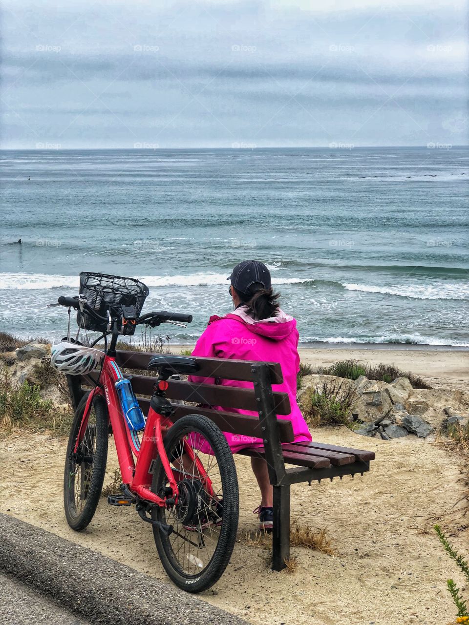 Woman and her Bike overlooking the ocean! 
