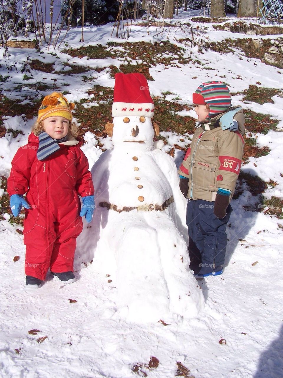 Kids with snowman