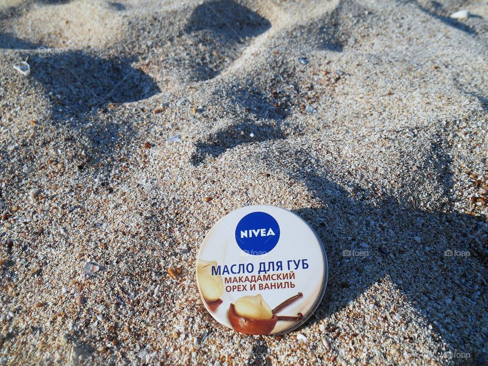 nivea on a sea sand