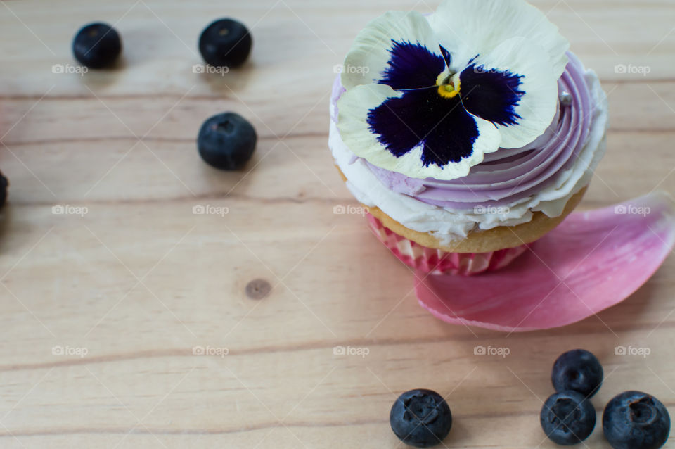 Cupcake with white vanilla frosting