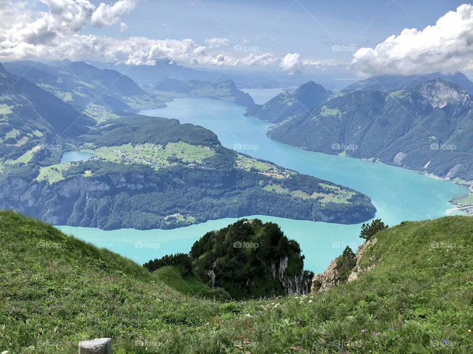 View of the lake, mountains and clouds