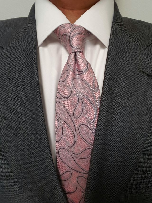 Man with pink tie