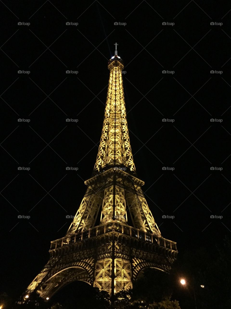 The Eiffel Tower at night. 