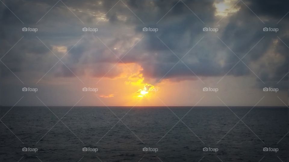 The sun is the happy in the center of grey