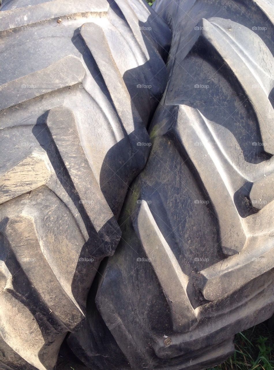 tractor tires waiting for work